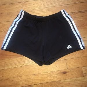 Black adidas shorts with white stripes